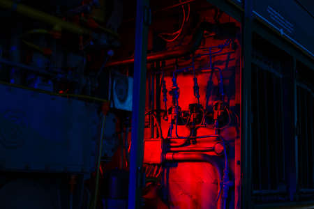 Strong connection with red train car metal coupling connected together as a business symbol of strength in partnership and an unbreakable agreement or contract between two team members.の写真素材