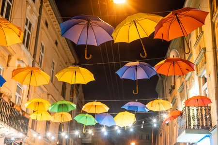 Street decorated with colored umbrellas. Lviv Ukraine.の写真素材