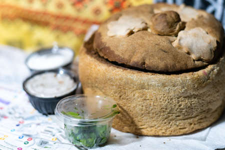 borscht served in bread bowl.の写真素材