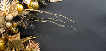 christmas decor gold glass balls on the wallの写真素材