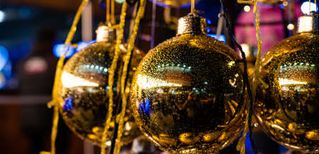 christmas decor gold glass balls on the wallの写真素材