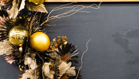 christmas decor gold glass balls on the wallの写真素材