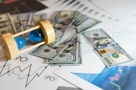 Concept With Dollar Chart And Hourglass
