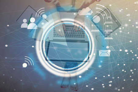 Businessman on blurred background using free wifi hotspot interface 3D renderingの写真素材