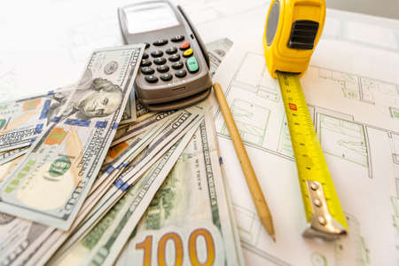 Architectural blueprints and instruments on the worktable. Construction background.の写真素材