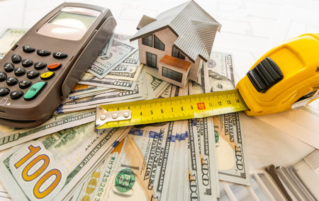 Construction plans, calculator, money and layout of the cottage. The cost of maintaining your own...