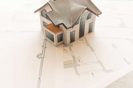 Design and construction of cottages. Layout and drawing of a country house. Architecture and construction. Layout of the house, boards. Private house.の写真素材