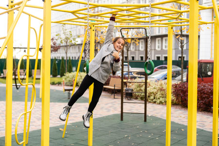portrait of a little schoolgirl girl at the playground