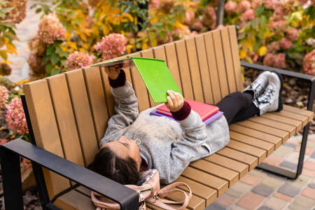 Beautiful little schoolgirl with a backpackの写真素材