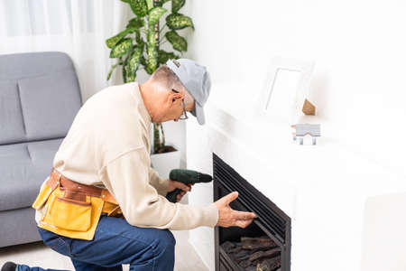 Fireplace installing. Fireplace made from Calcium Silicate Fire Protective Boardの写真素材