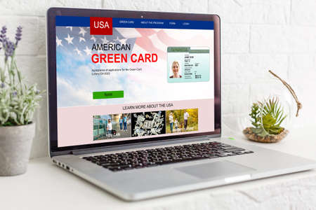 laptop with Permanent resident card of USA websiteの写真素材