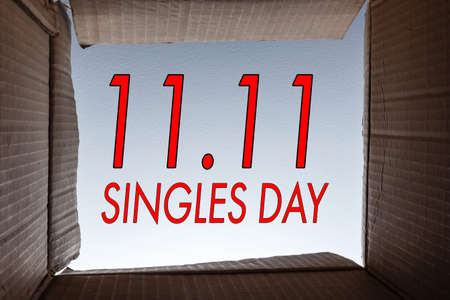 Chinese 11.11 single day sale concept, including mini shopping cart, gift boxs, and sale tag.の写真素材