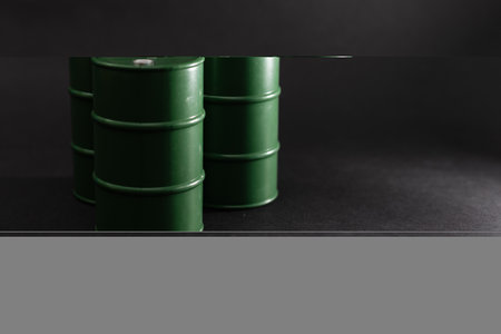 oil barrels on black background