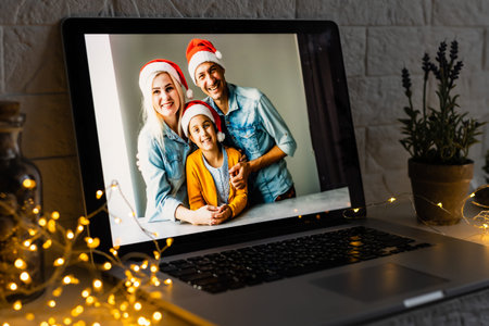 young family video call smiling and looking at webcam web, lovers greet friends merry christmas and...