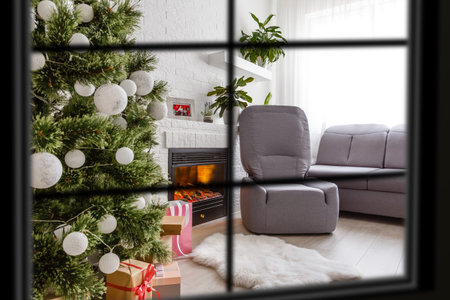 wiew through the window, Christmas Tree on background, winter holiday concept,