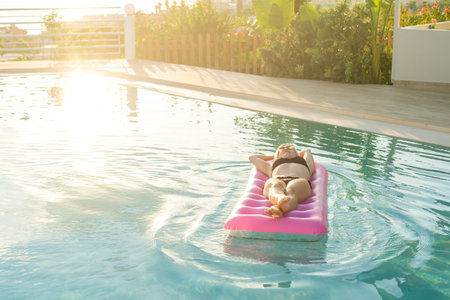 Vacation. Woman in a swimming pool