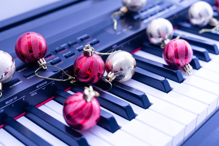 Top view close up shot of piano keyboard and Christmas decorationの写真素材