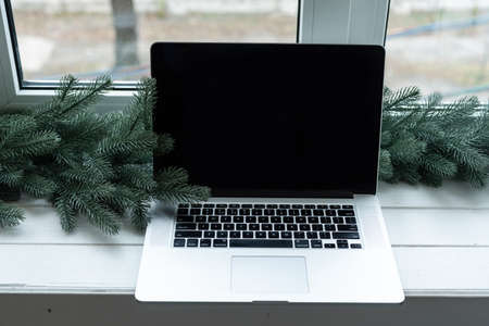 Decorated for new year room no people and laptopの写真素材