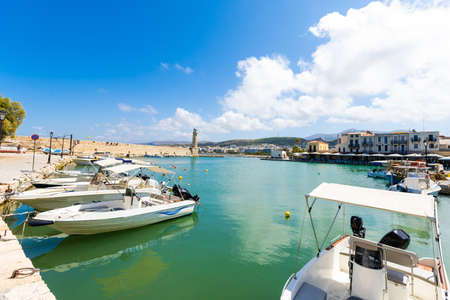 Crete, Greece. Harbor with marine vessels, boats and lighthouse. Rethymnoの写真素材