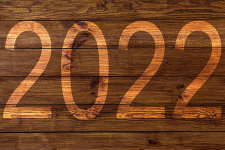 The year 2022 written in vintage backgroundの写真素材