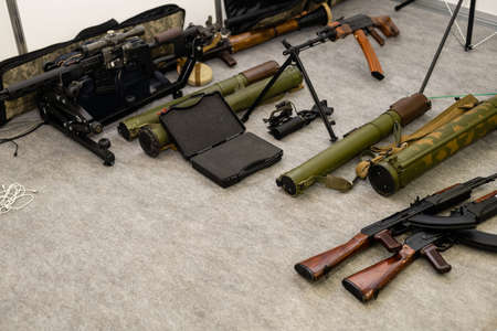 Storage a lot of riffle machine gun. Weapon firearm arsenal safe roomの写真素材