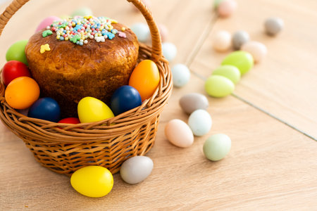 Easter cake and colorful eggs on festive Easter table