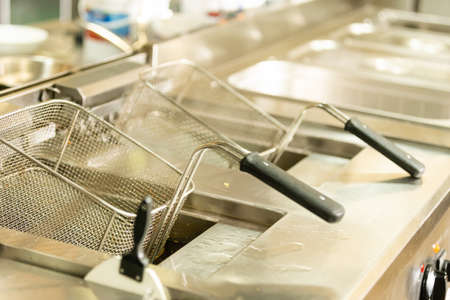 square basket sieve for frying in oil, top viewの写真素材