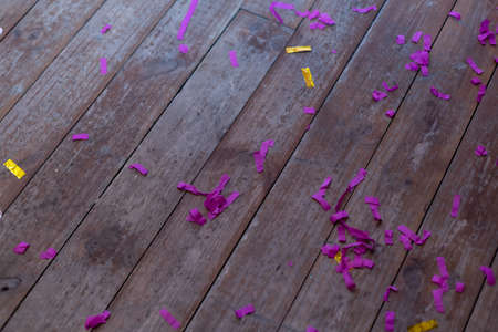 Top view of floor with after a party celebration with party decorations, messy living room interior, After party chaos, birthday.の写真素材
