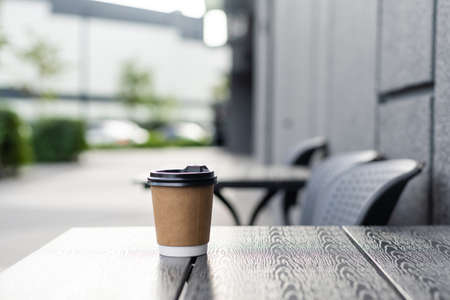 rooftop cafe, open terrace with wooden tables.の写真素材