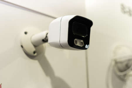 Security Camera, CCTV on location. Security camera on the wall in old city.の写真素材