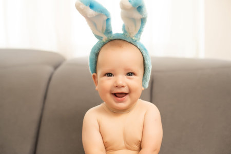 Boy dressed as bunny and Easter eggs