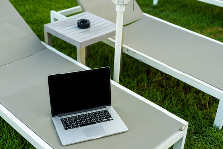computer on table background as a pool.