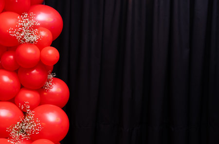 Photo zone with wallpaper, red balloons