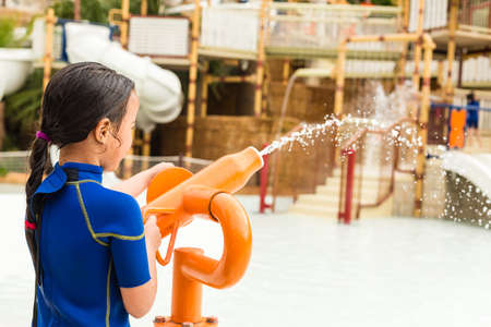 The kids playing in water attractions in Siam waterpark in Tenerife, Spain. The Siam is the largest water theme park in Europe.の写真素材
