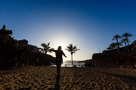 Relaxed woman enjoying beach and Canary Islands vacation.