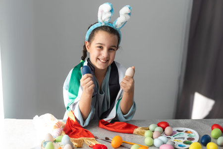 little girl with uae flag for easter