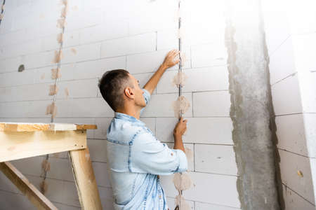 wiring. wire in the wall, repair. space for textの写真素材