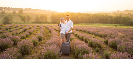 man and woman travel lifestyle and passengers passport in a lavender fieldの写真素材