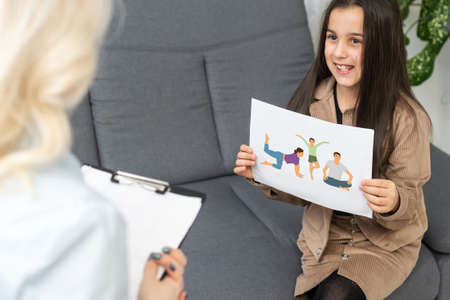 Young child psychologist working with little girlの写真素材