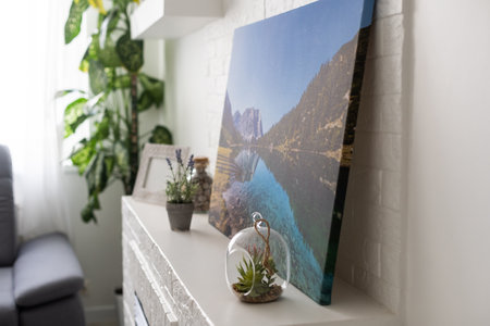 photo canvas on a fireplace shelfの写真素材