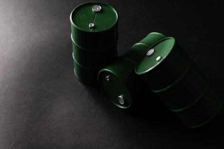 oil barrels on black background