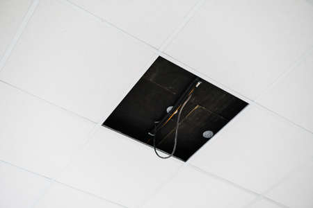 Ceiling and lighting inside office building.の写真素材