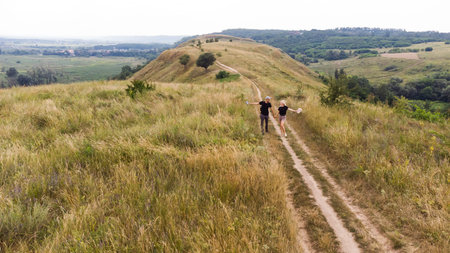 hilly landscape. Beautiful view with hills, clouds and trees. The nature.の写真素材