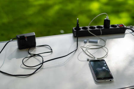 Phone charging with energy bank. Depth of field on Power bankの写真素材