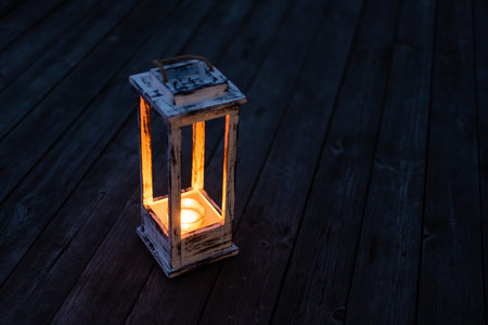 burning old candle vintage wooden candlestick