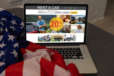 laptop with shopping banner and usa flagの写真素材