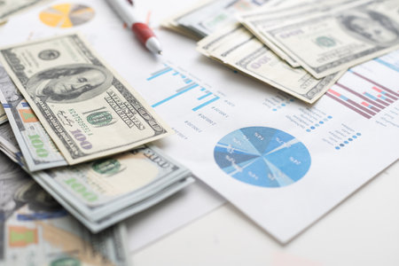 money concept, graph, chart document and pen on desktop.の写真素材