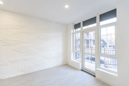 Modern empty elegant office with windows and workplaces.