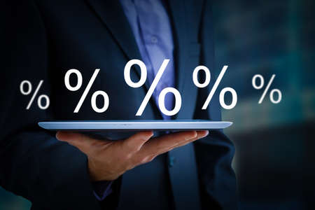 Discount Percentage Sign. Hand Showing Discount Percent.の写真素材