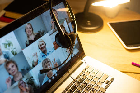 Online remote learning. Teacher having video conference chat with student and class group. Teaching and learning from home during quarantineの写真素材